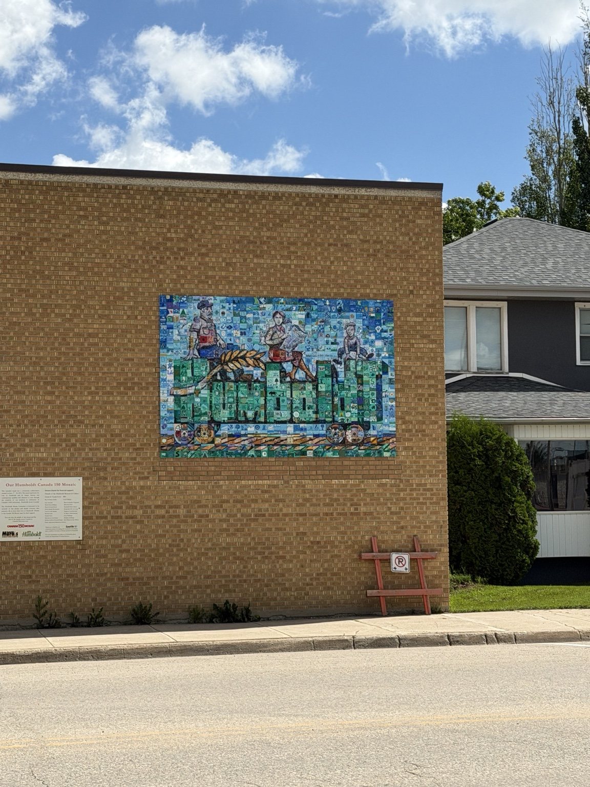 Humboldt Canada 150 community mosaic mounted on a downtown building