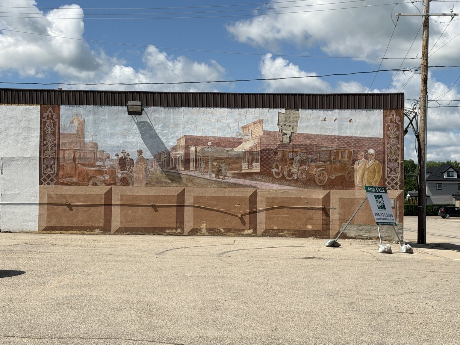 Large historic mural depicting an early Humboldt streetscape
