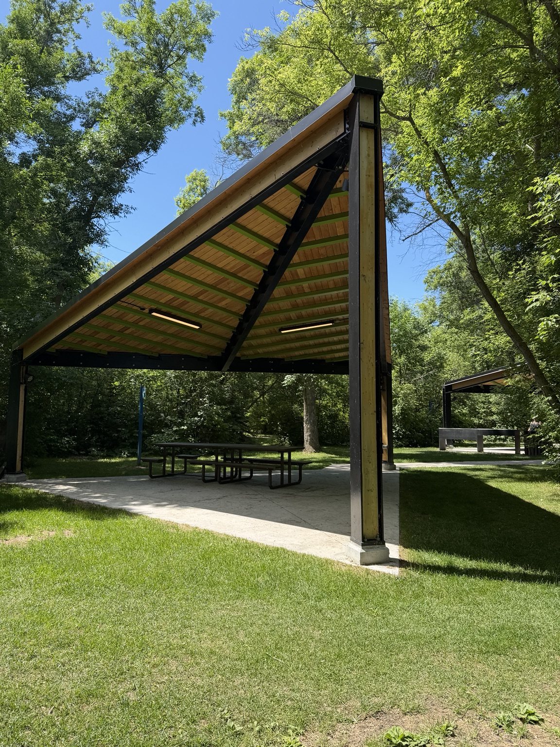 Shaded picnic shelter at Pike Lake Provincial Park
