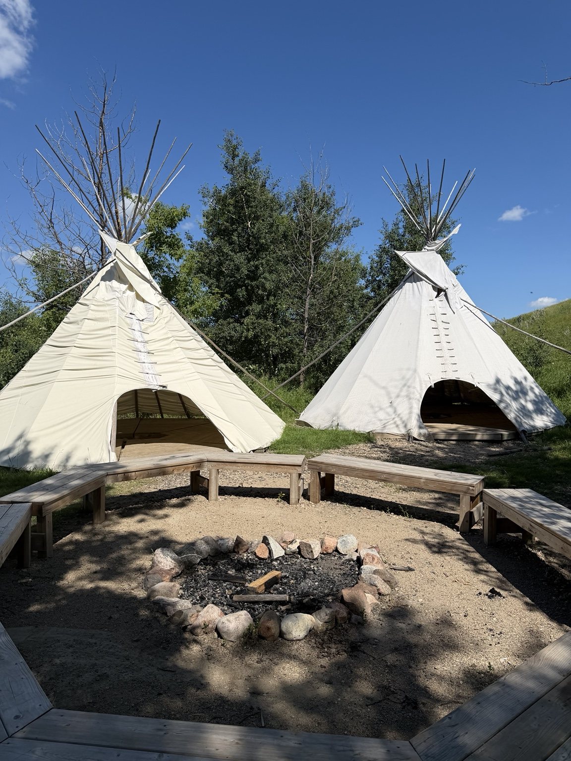 Tipis and gathering area in the Wanuskewin valley