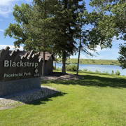 Blackstrap Provincial Park entrance sign with Blackstrap Lake in the background