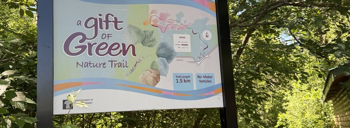Gift of Green Nature Trail trailhead sign at Pike Lake Provincial Park